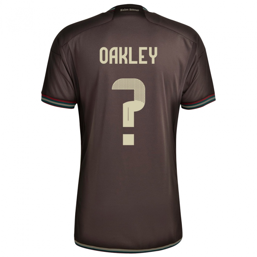 Bambino Maglia Giamaica Katie Oakley #0 Marrone Notte Kit Gara Away 24-26 Maglietta